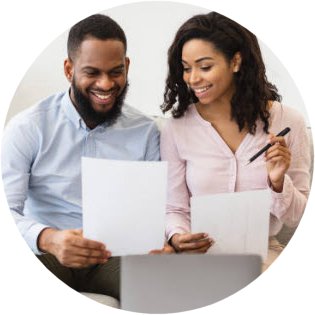 Couple smiling with invoices